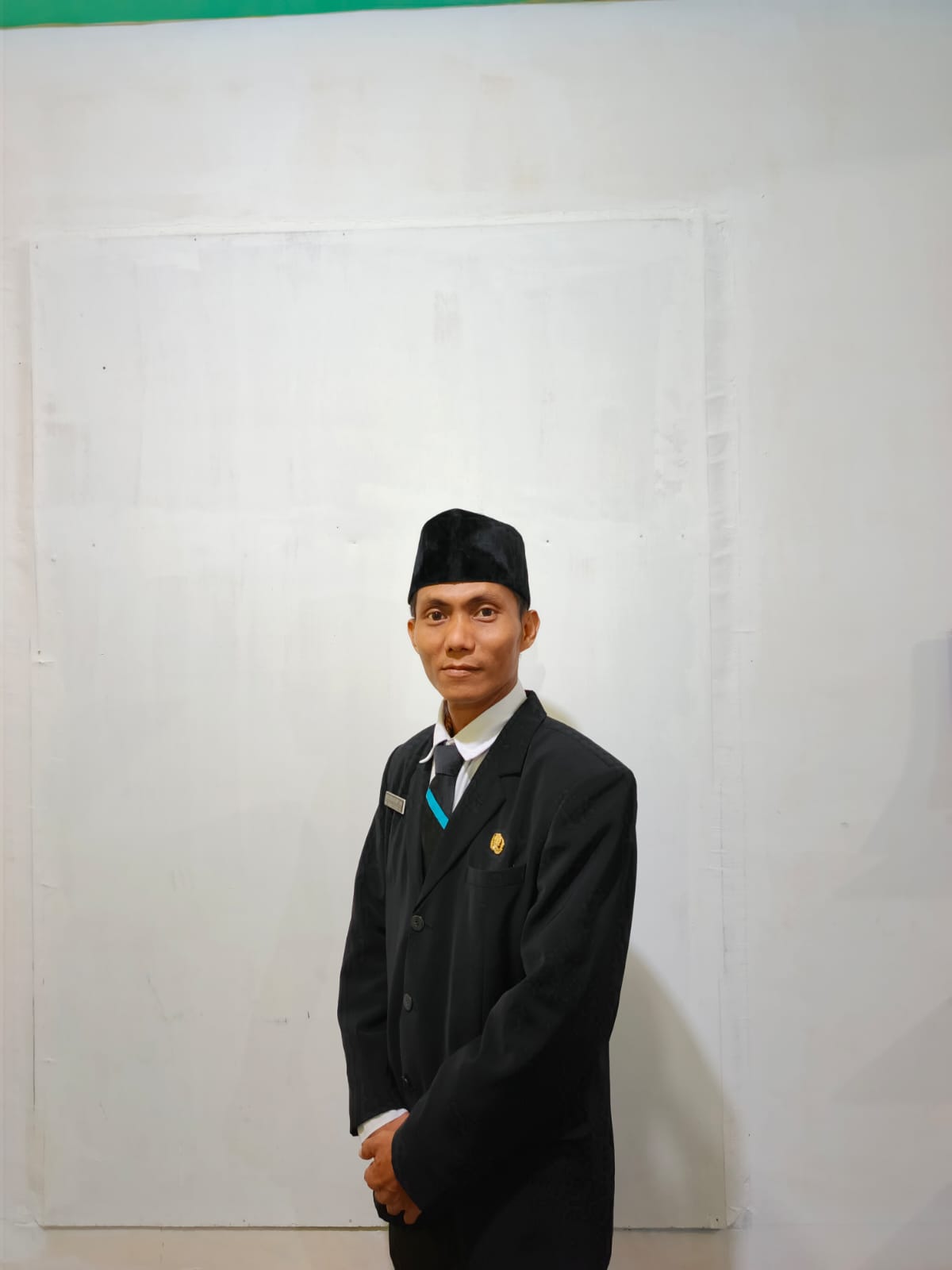 Arie Sarbaini Harahap,S.Pd.I
